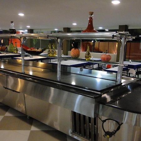 Arrastao Premium Plaza Hotel Muriae Bagian luar foto