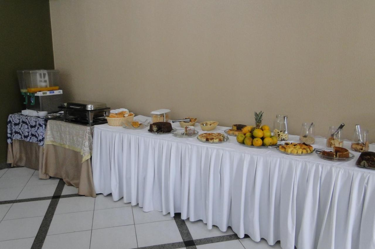 Arrastao Premium Plaza Hotel Muriae Bagian luar foto