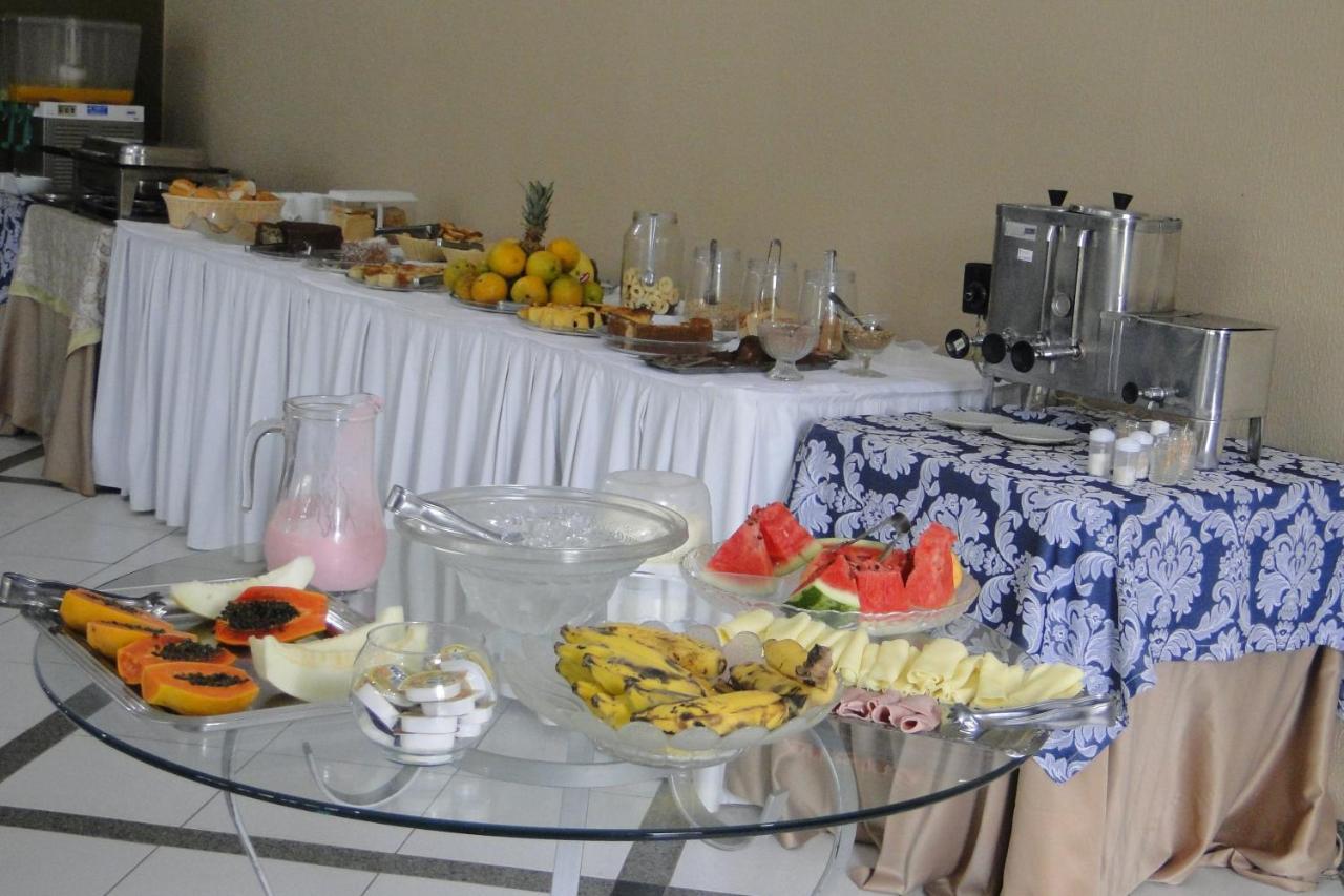 Arrastao Premium Plaza Hotel Muriae Bagian luar foto