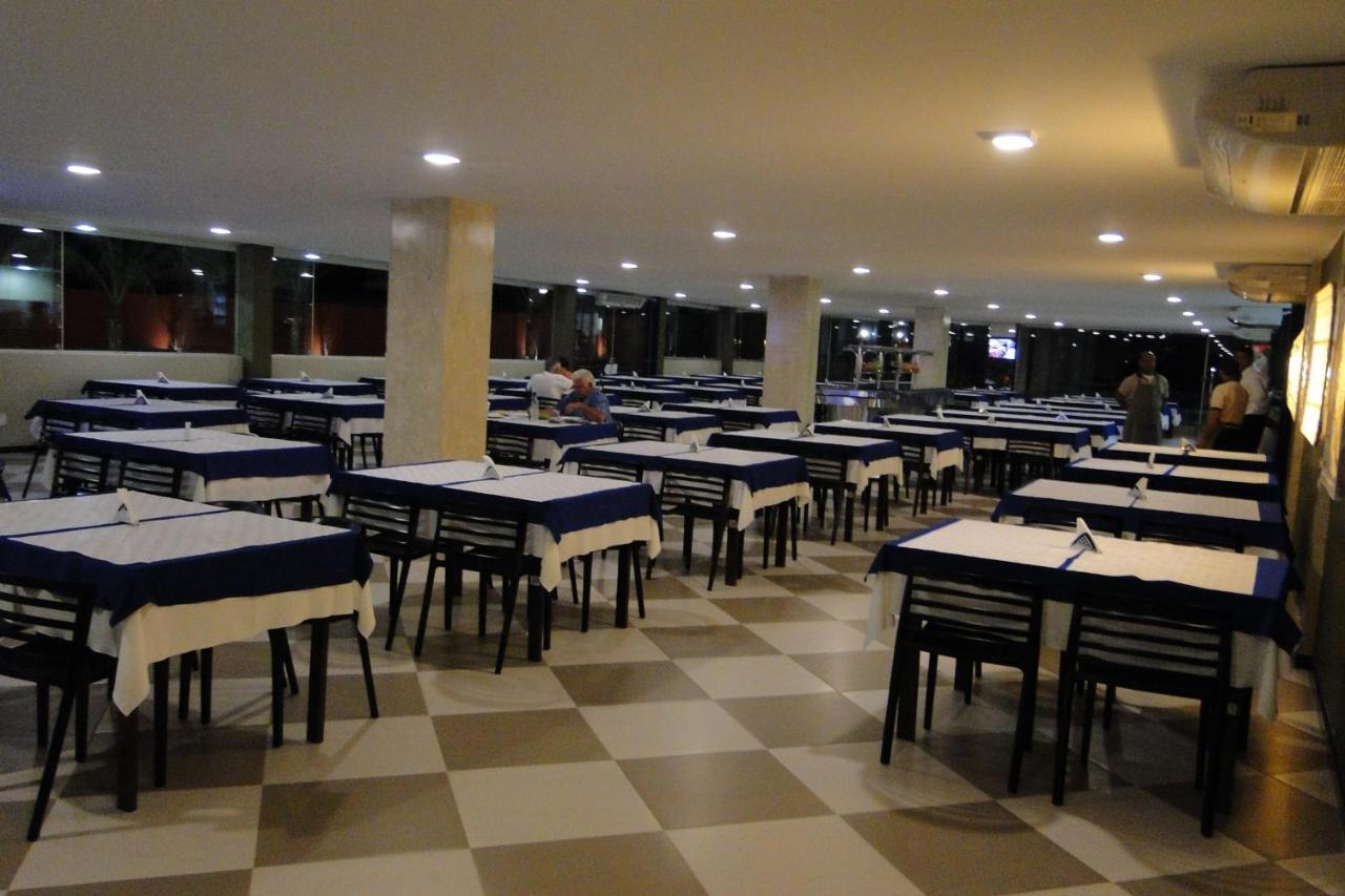 Arrastao Premium Plaza Hotel Muriae Bagian luar foto